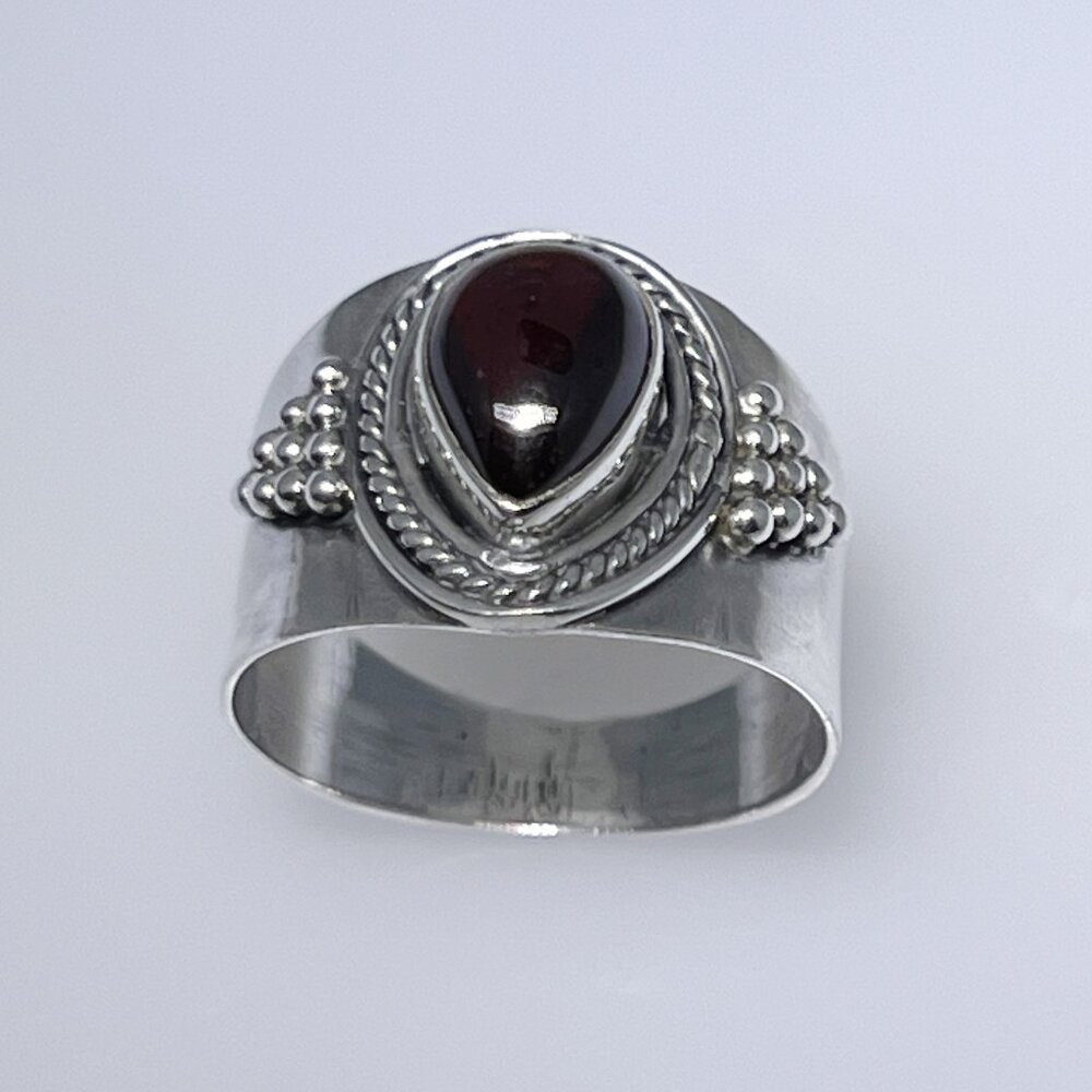 Sterling silver band ring with pear or teardrop Garnet cabochon, size: 8.75